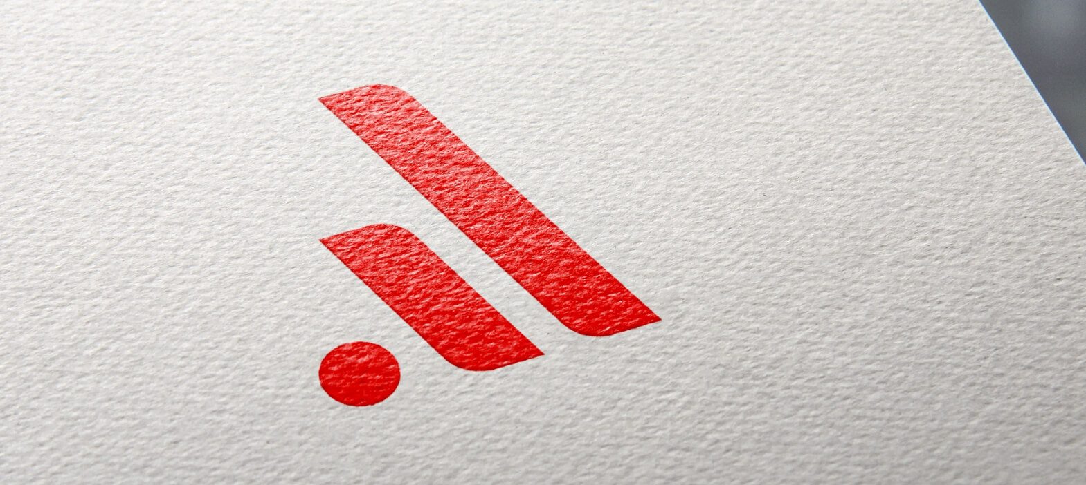Admail West logo mark printed on paper