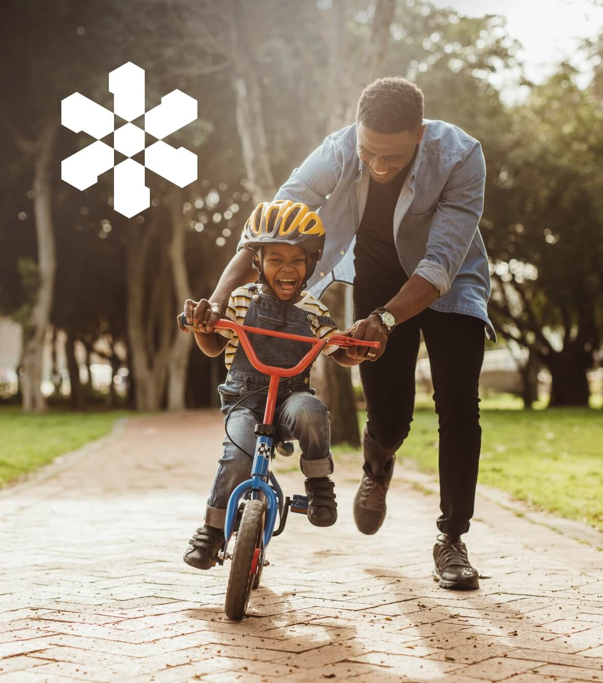 SGC Catalyst event graphic on photo of man teaching son to ride bike